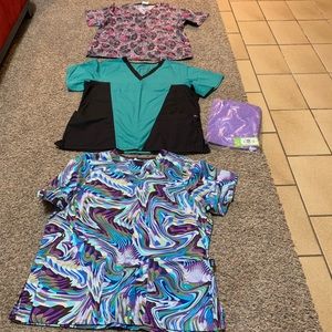 Scrub tops bundle of 4. All new.